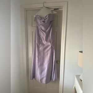 Worn once purple Bella’s Bridesmaids dress with bow on front!